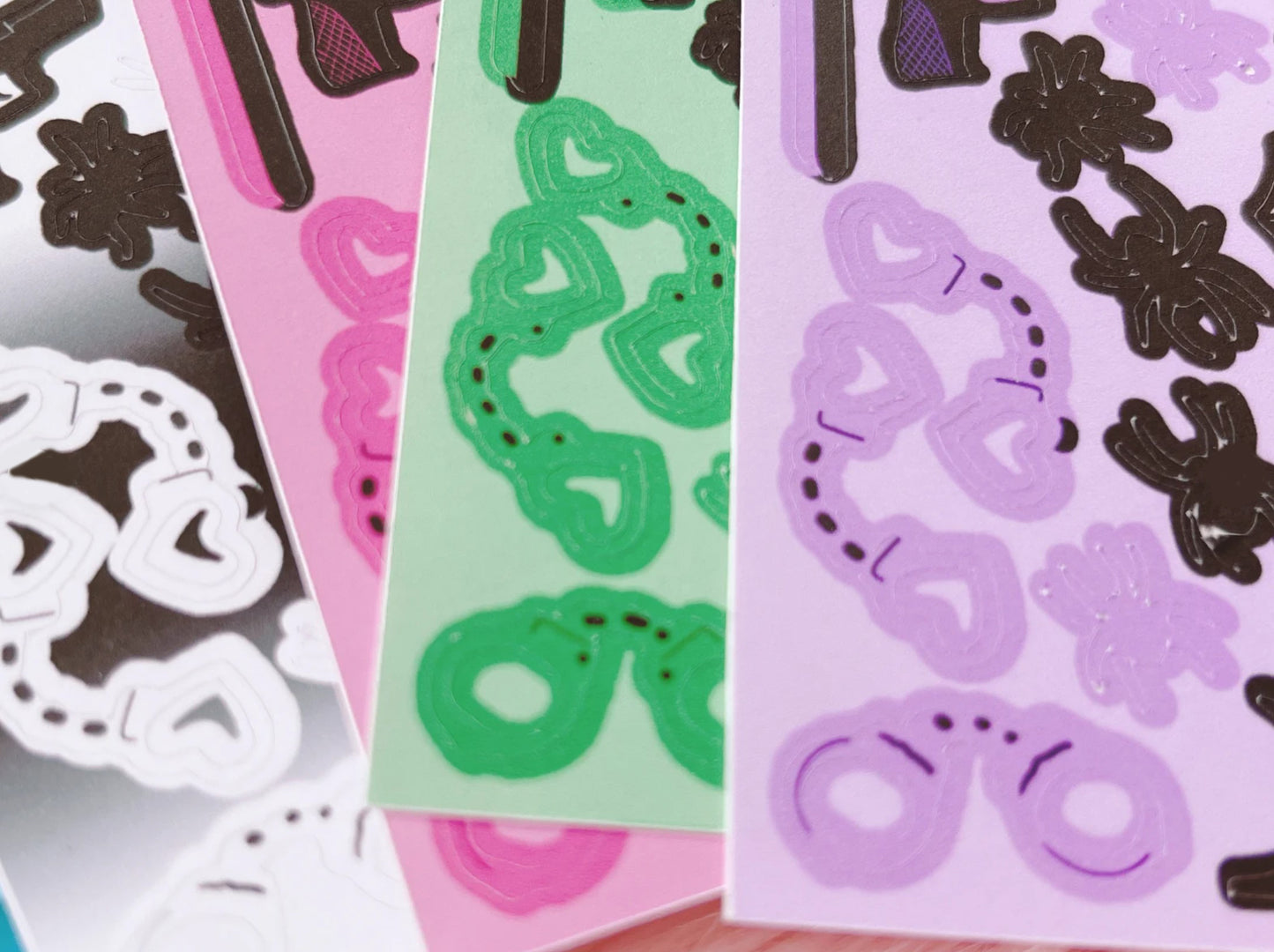 Spider web handscuff and more sticker sheets